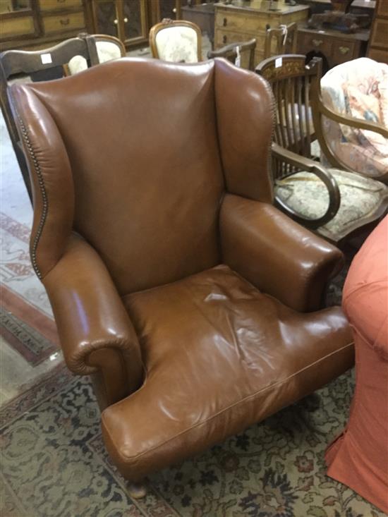 Hide covered wing armchair